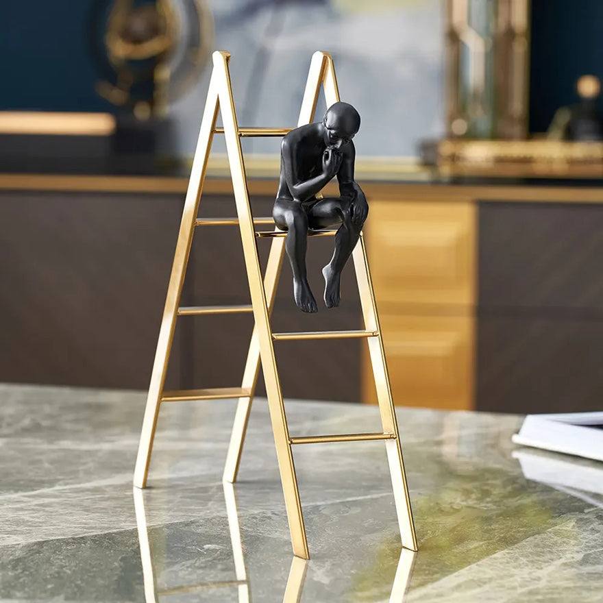 Enhabit Man on Ladder Decorative Accent - Black & Gold